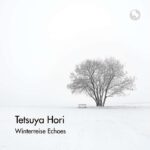 Album cover for “Winterreise Echoes” by Tetsuya Hori, showing a lone tree and bench in a minimalist snowy winter landscape.